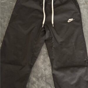 Nike Young Men’s Black Sweatpants with White Drawstring
